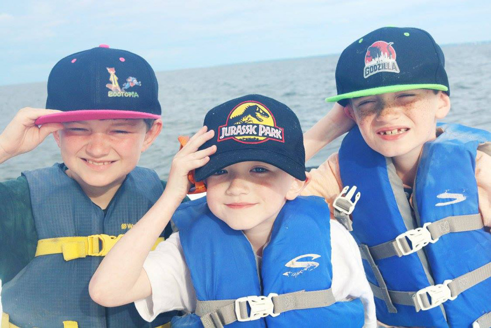 Boys on a charter fishing boat Boys on a charter fishing boat