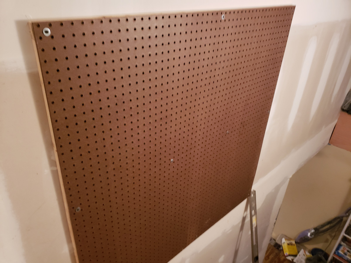 one completed section of pegboard one completed section of pegboard